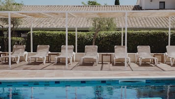 Outdoor pool, pool umbrellas, pool loungers