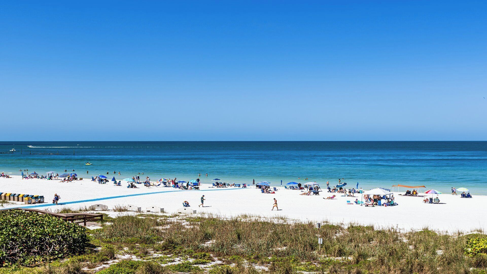 On the beach, sun loungers, beach towels