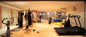 Stay fit and entertained in our well-equipped gym with a variety of exercise equipment and a TV for your convenience.