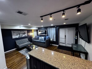 Smart TV, fireplace, DVD player, books
