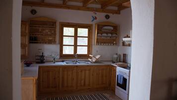 Cottage, 2 Bedrooms, Sea View, Courtyard Area | Private kitchen | Full-sized fridge, microwave, oven, stovetop