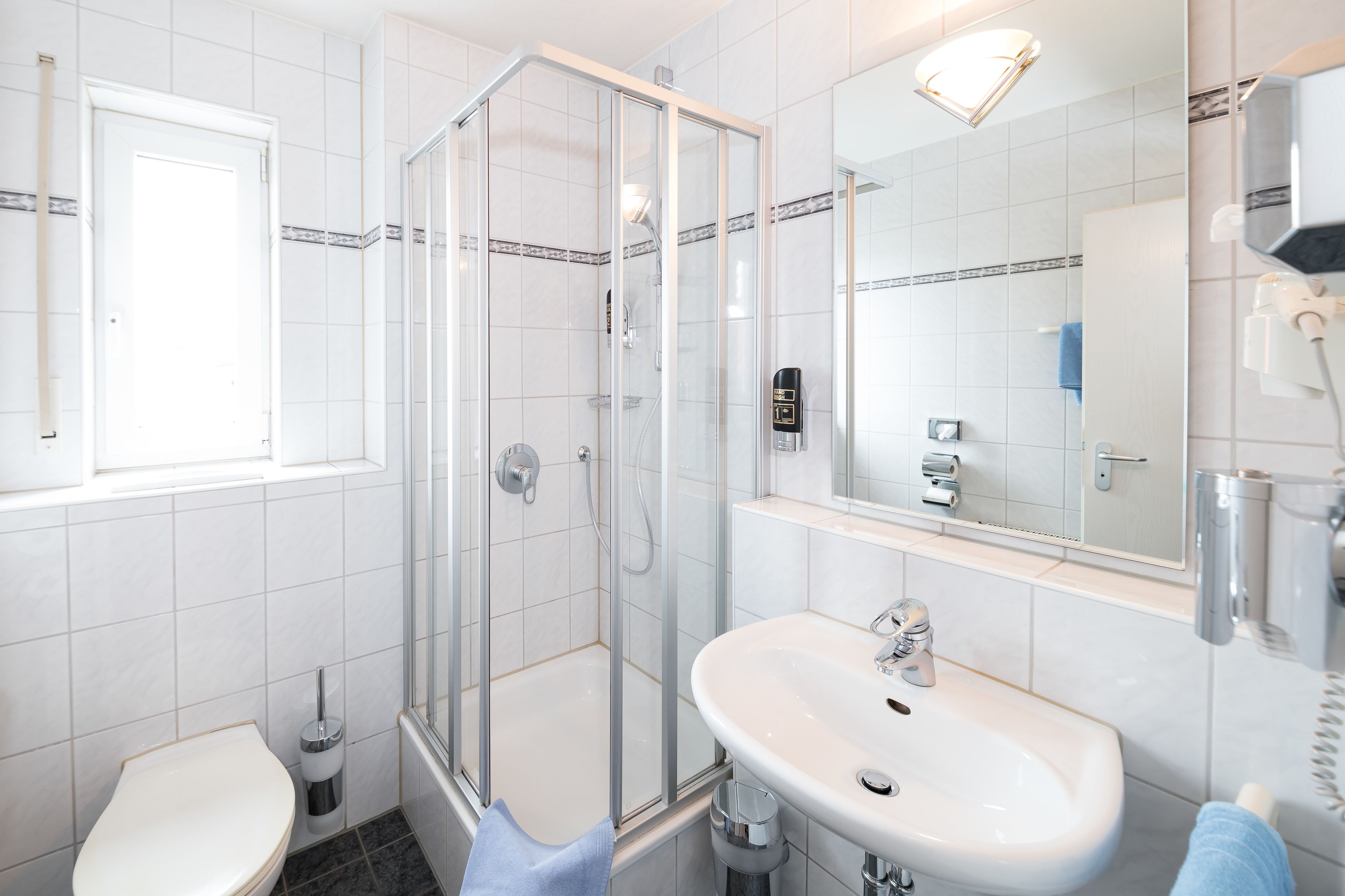 comfort double room | bathroom | shower, free toiletries, hair dryer, towels