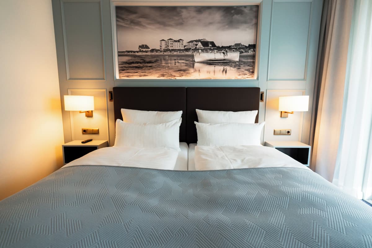 Junior Suite | 2 bedrooms, premium bedding, minibar, in-room safe