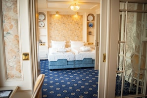 2 habitaciones, ropa de cama de alta calidad y minibar