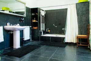 Bathtub, hair dryer, towels