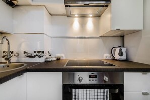 Apartamento | Cozinha privada | Geladeira, fogão, cooktop, lava-louças
