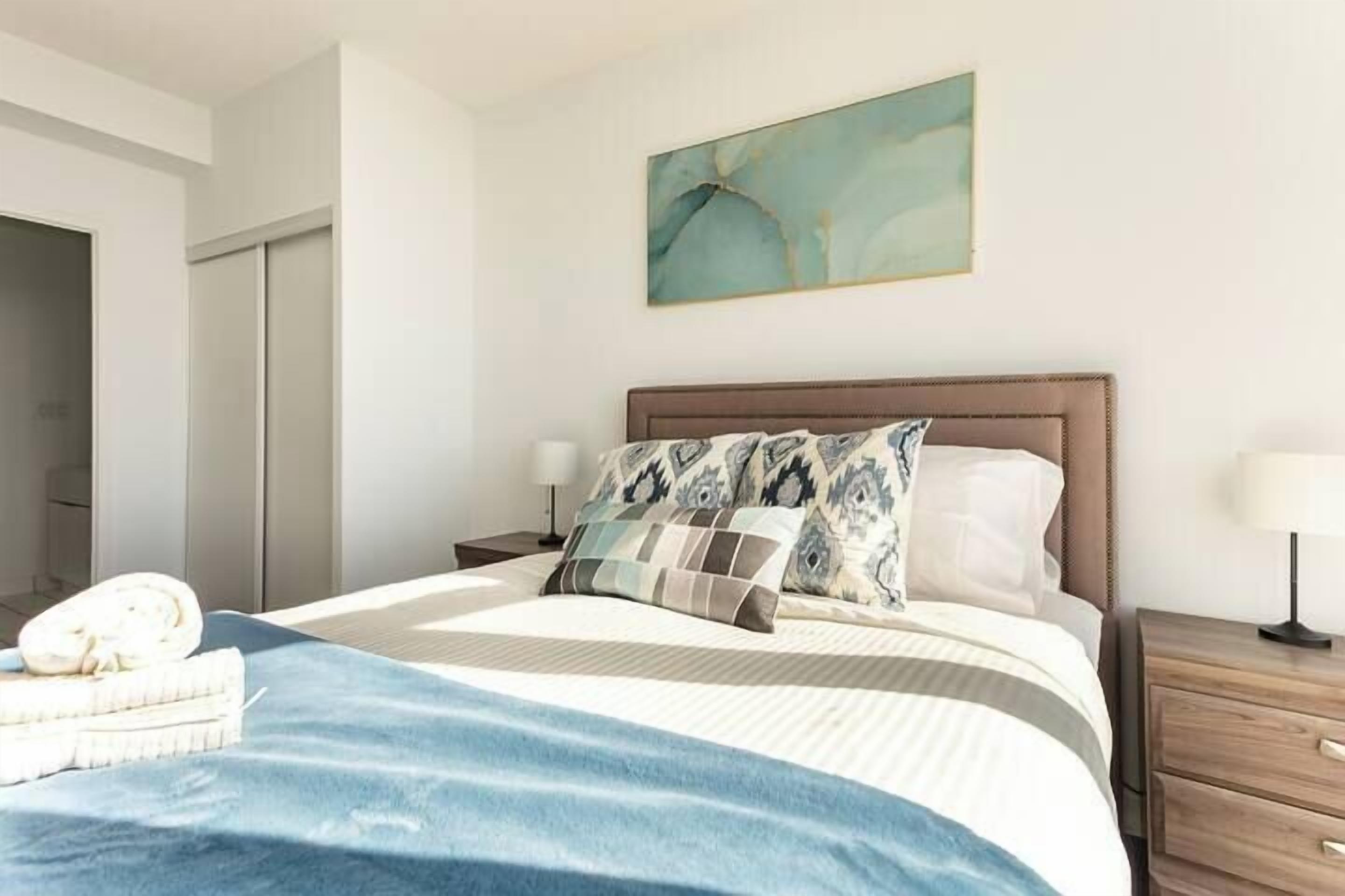 luxury condo, 2 bedrooms, lake view | 2 bedrooms, desk, laptop workspace, blackout curtains