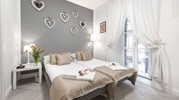 2 chambres, coffres-forts dans les chambres, fer et planche Ă repasser