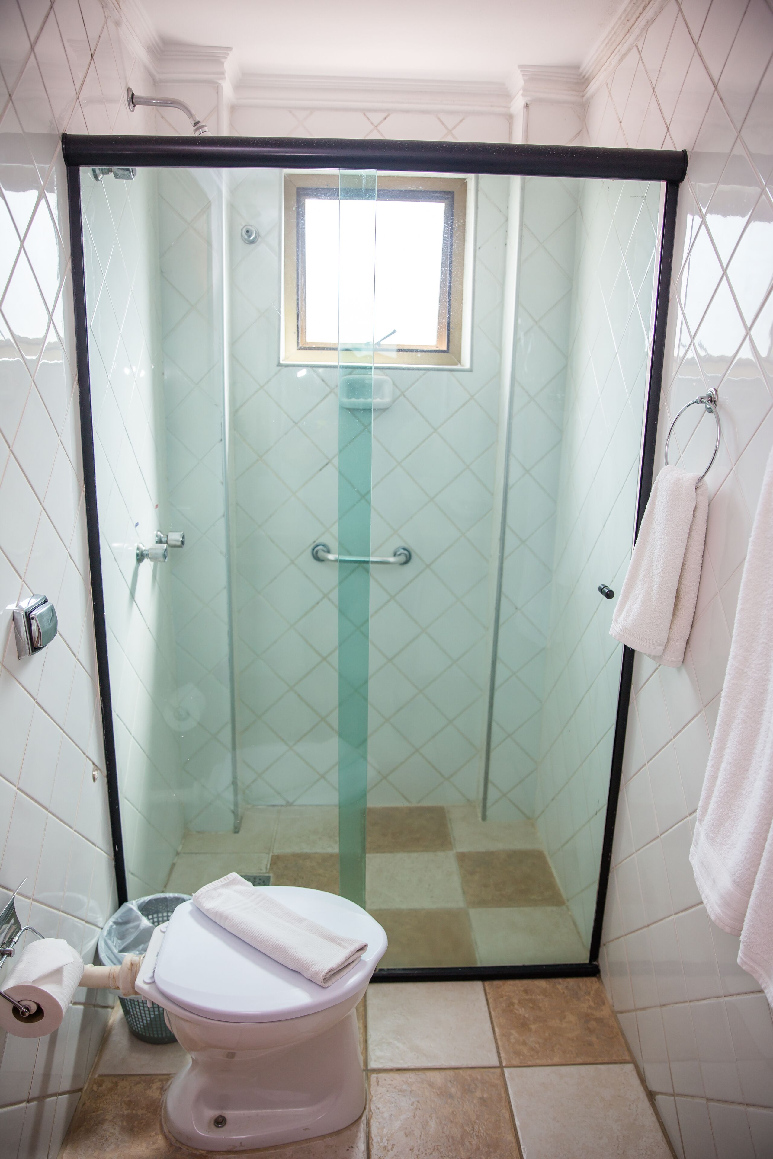 superior single room | bathroom | shower, towels