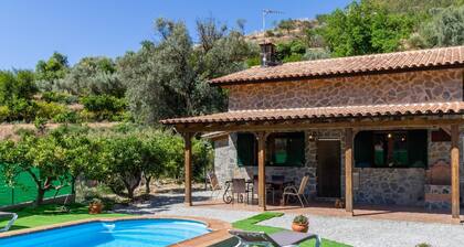 Charming farmhouse among orange trees