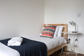 3 bedrooms, desk, iron/ironing board, travel cot