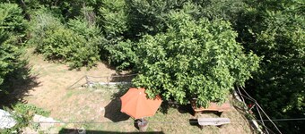 Holiday apartment in the mountains and lake in a period house in the medieval village I Cardi