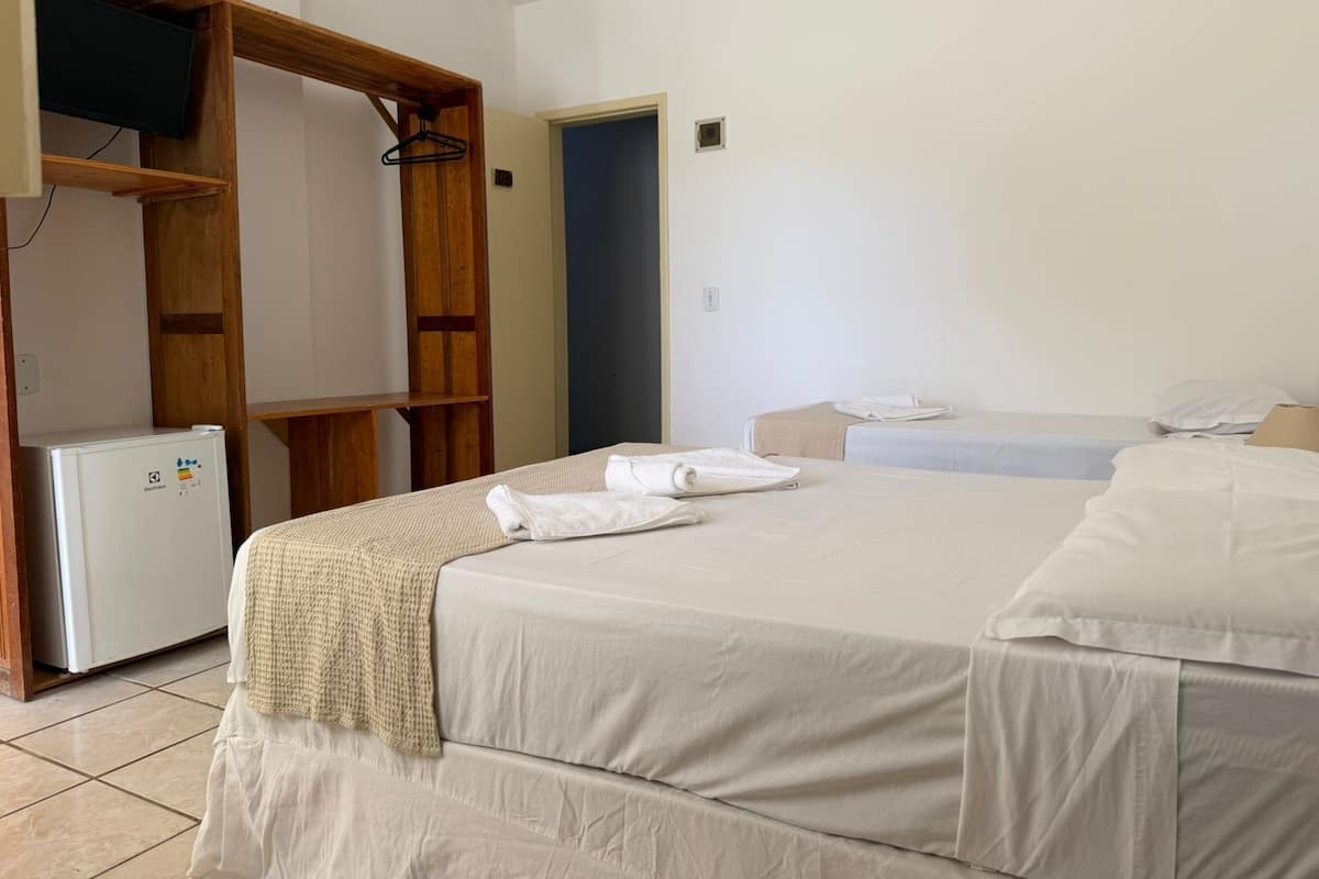 Deluxe Room, Pool View | Minibar, iron/ironing board, free WiFi, bed sheets