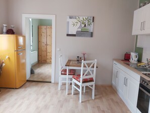 Fridge, microwave, stovetop, coffee/tea maker