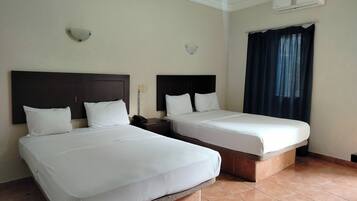 Standard Triple Room, Multiple Beds | Desk, free WiFi, bed sheets