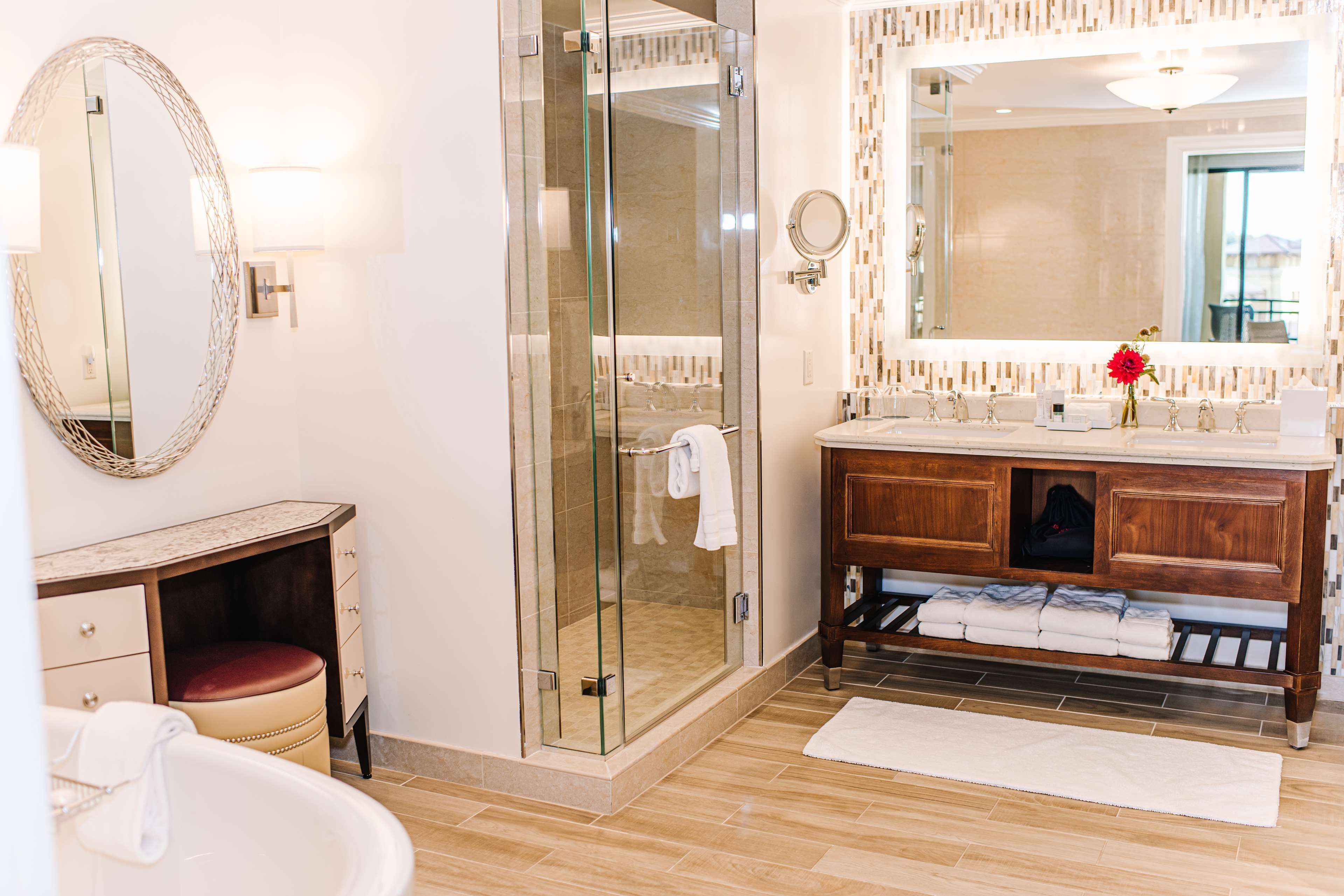 designer toiletries, hair dryer, bathrobes, slippers