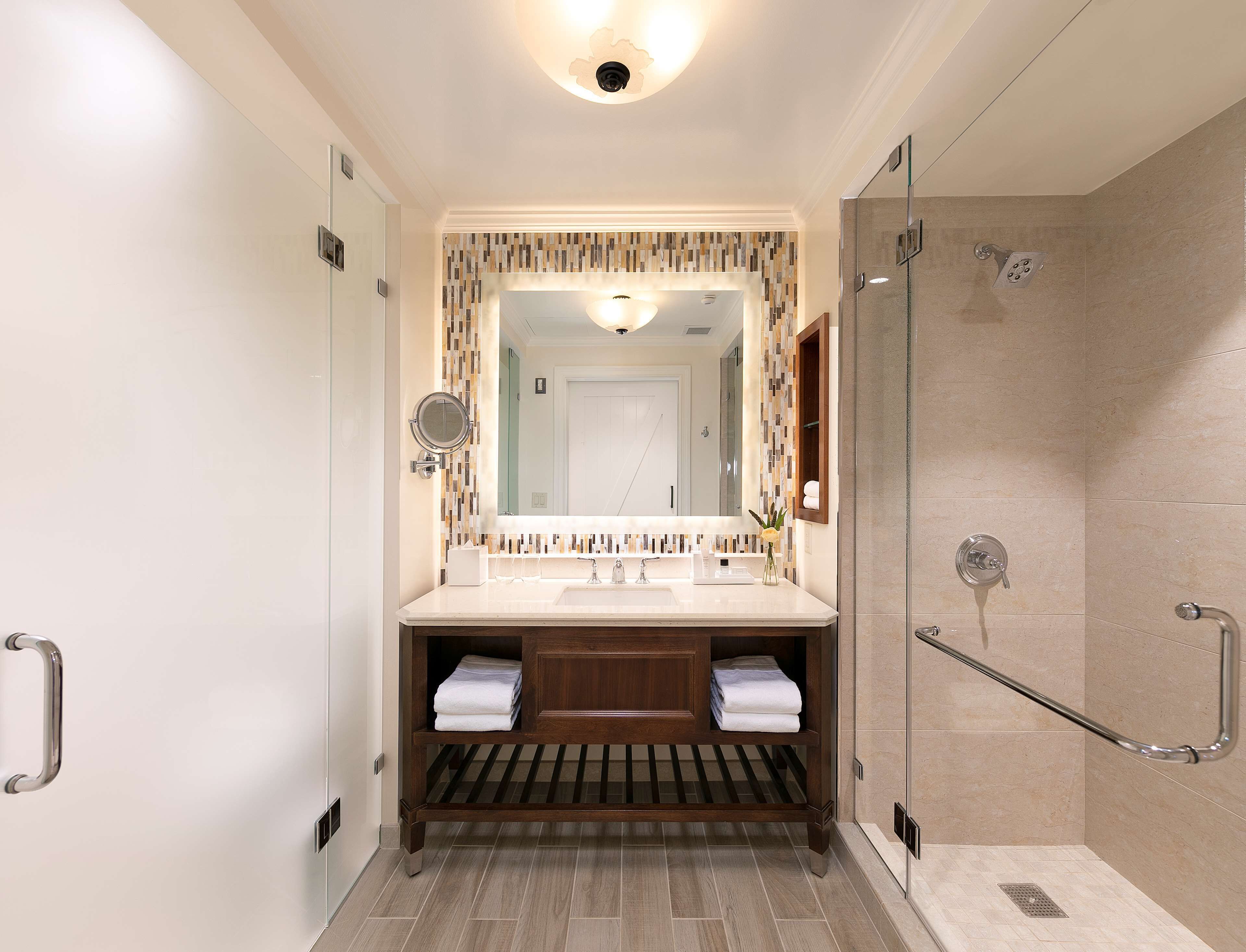 designer toiletries, hair dryer, bathrobes, slippers