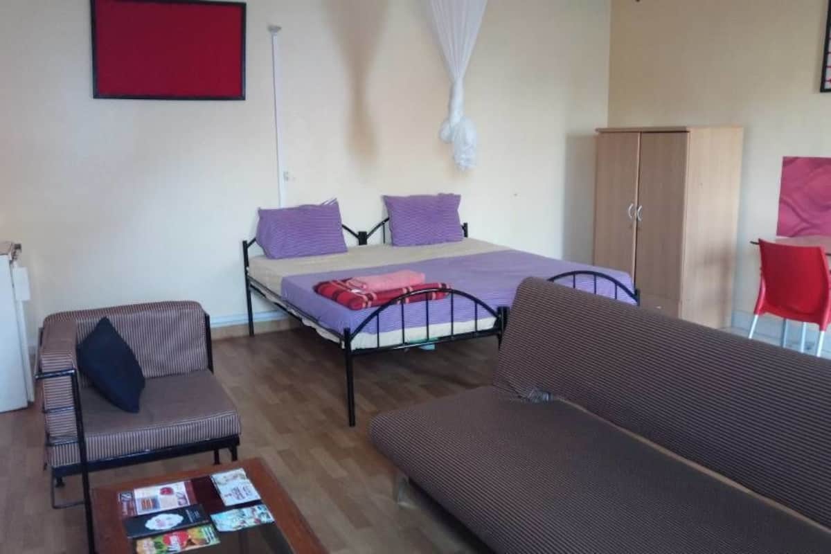 Double Room | Living area | Flat-screen TV