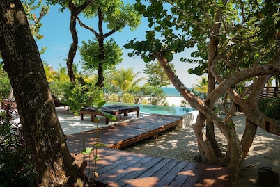 Oceanfront 4 Bedroom Bungalow with Private Pool, Large beach area and Staff