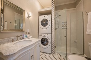 Shower, hair dryer, towels, soap