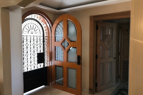 Best of Both Worlds with solid door and locking gate for fresh air when wanted.