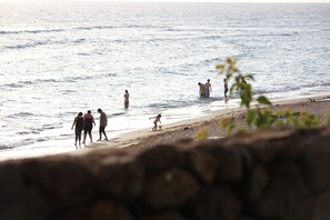 On the beach, sun loungers, beach towels