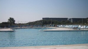A swimming pool with multiple lanes, a tiled deck, and lounge chairs. - True DIRECT Oceanfront - Admiral's Row 305 - Right on the Beach!  Best View! (Hilton Head Island)