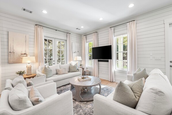 Flat-screen TV, fireplace, table tennis