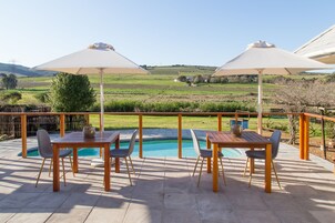 2 outdoor pools, pool umbrellas, sun loungers