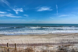 On the beach - A Breath of Fresh Aire - the beach literally comes right up to your deck!! (North Topsail Beach)