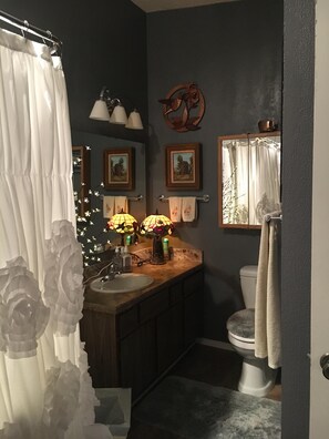 Bathtub, hair dryer, towels