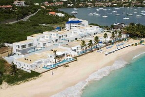 On the beach, sun-loungers, beach towels