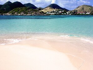 On the beach, sun-loungers, beach towels