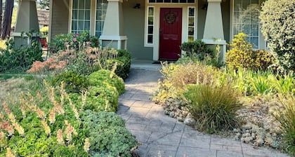 Charming craftsman home on 1.1 acres close to town and beautiful beaches