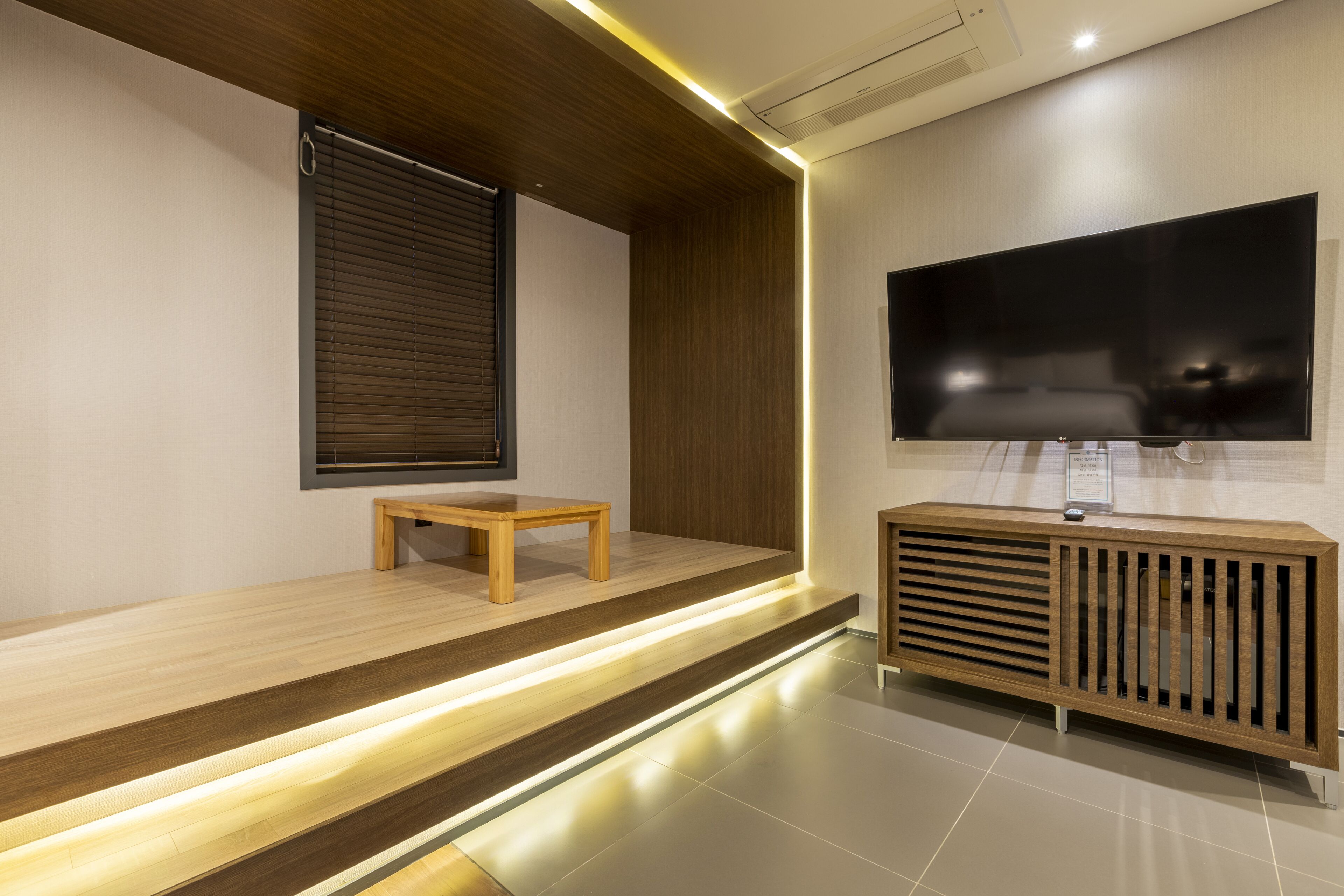 Suite, 1 King Bed | Living area | 43-inch flat-screen TV with digital channels, TV, heated floors