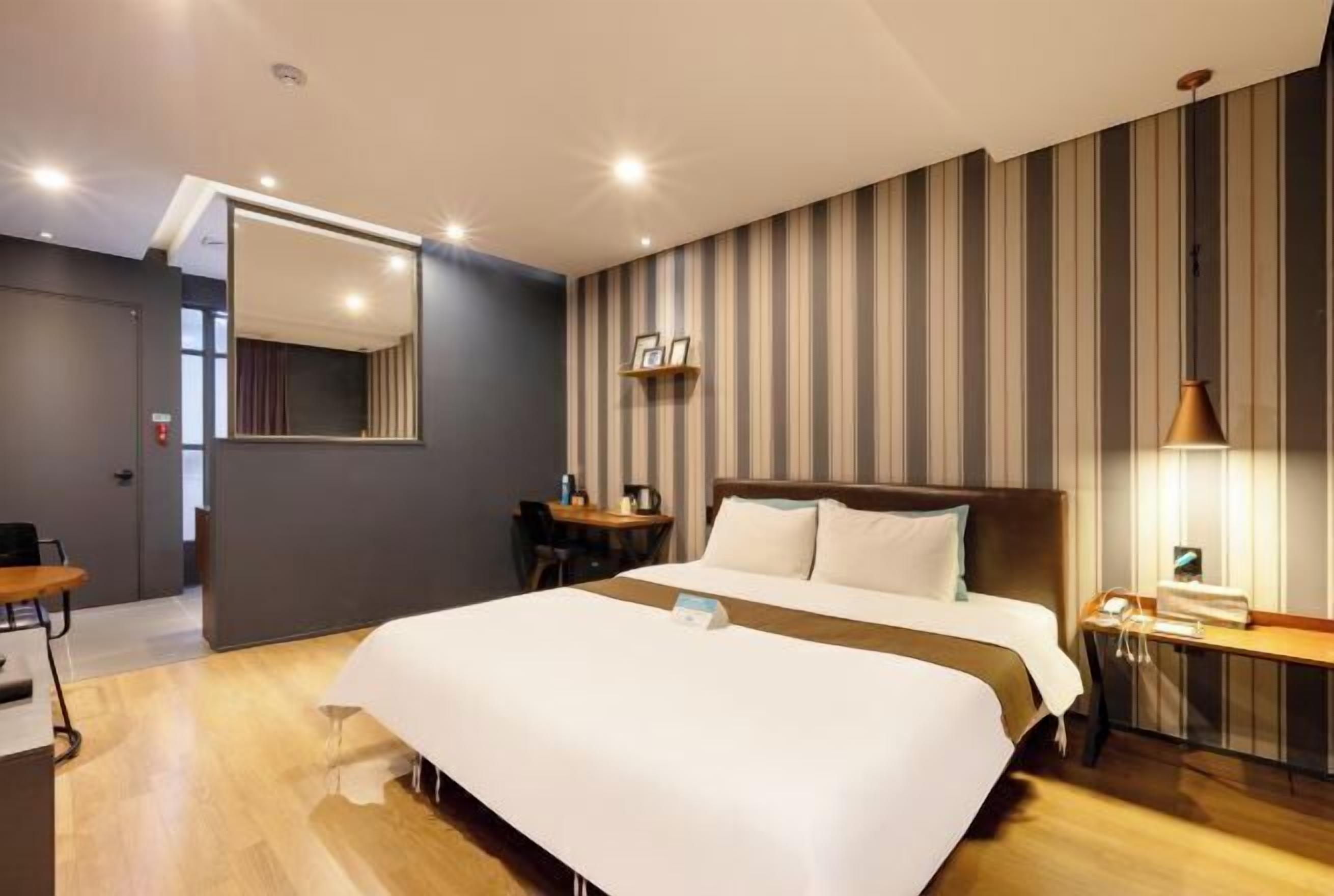 Premium bedding, down comforters, memory foam beds, in-room safe