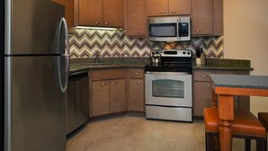 A compact kitchen with a refrigerator, microwave, stove, and oven. - Marriott Summit Watch Full 2 Bed/2 Bath sleeps 8 at the Town Lift on Main St. (Park City)