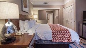 A hotel room with a bed, a desk with a lamp, a television, and a wardrobe. - Marriott Summit Watch Full 2 Bed/2 Bath sleeps 8 at the Town Lift on Main St. (Park City)