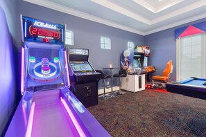 Game room - Magic Villa at Reunion | 9BR Luxe Oasis w/ Game Room, Theater, and Private Lazy River Near Disney (Kissimmee)