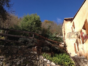 Traditional architecture meets serene surroundings in this charming building.