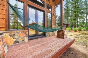 A wooden deck with a hammock. - Mountain Majesty at Grays Crossing By Tahoe Getaways -  4BR 4BA  w/ Private Hot Tub (Truckee)