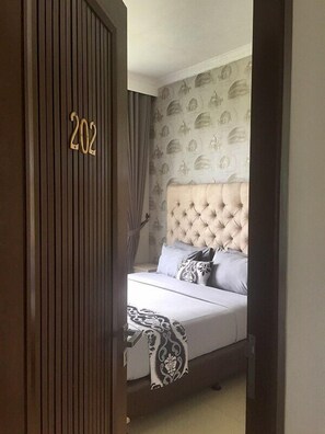 Family Villa, 4 Bedrooms (Rinjani) | 1 bedroom, in-room safe, desk, laptop workspace - Avilla Resort Puncak (Cisarua)