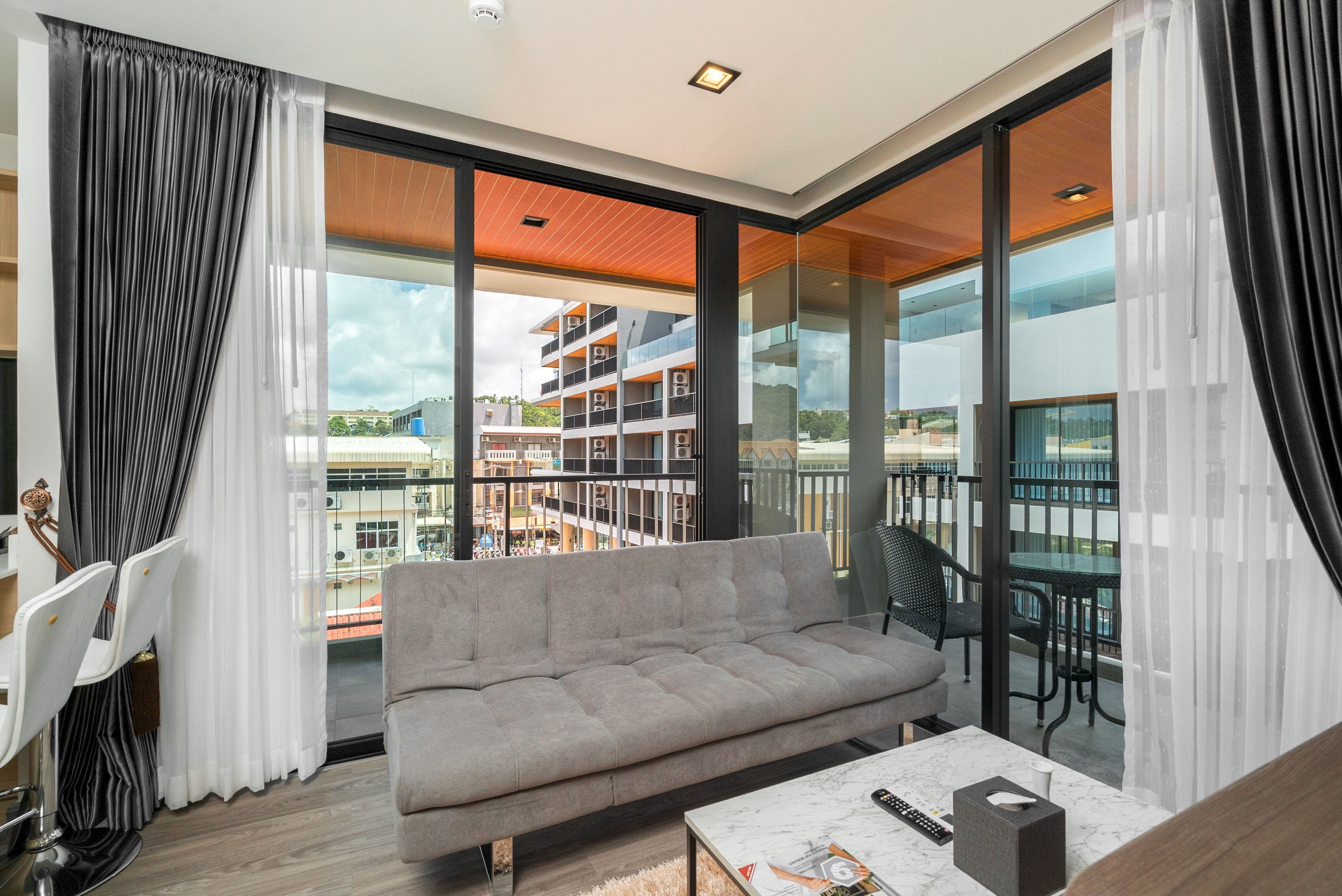 one bedroom deluxe plus | living room | 40-inch led tv with satellite channels, tv