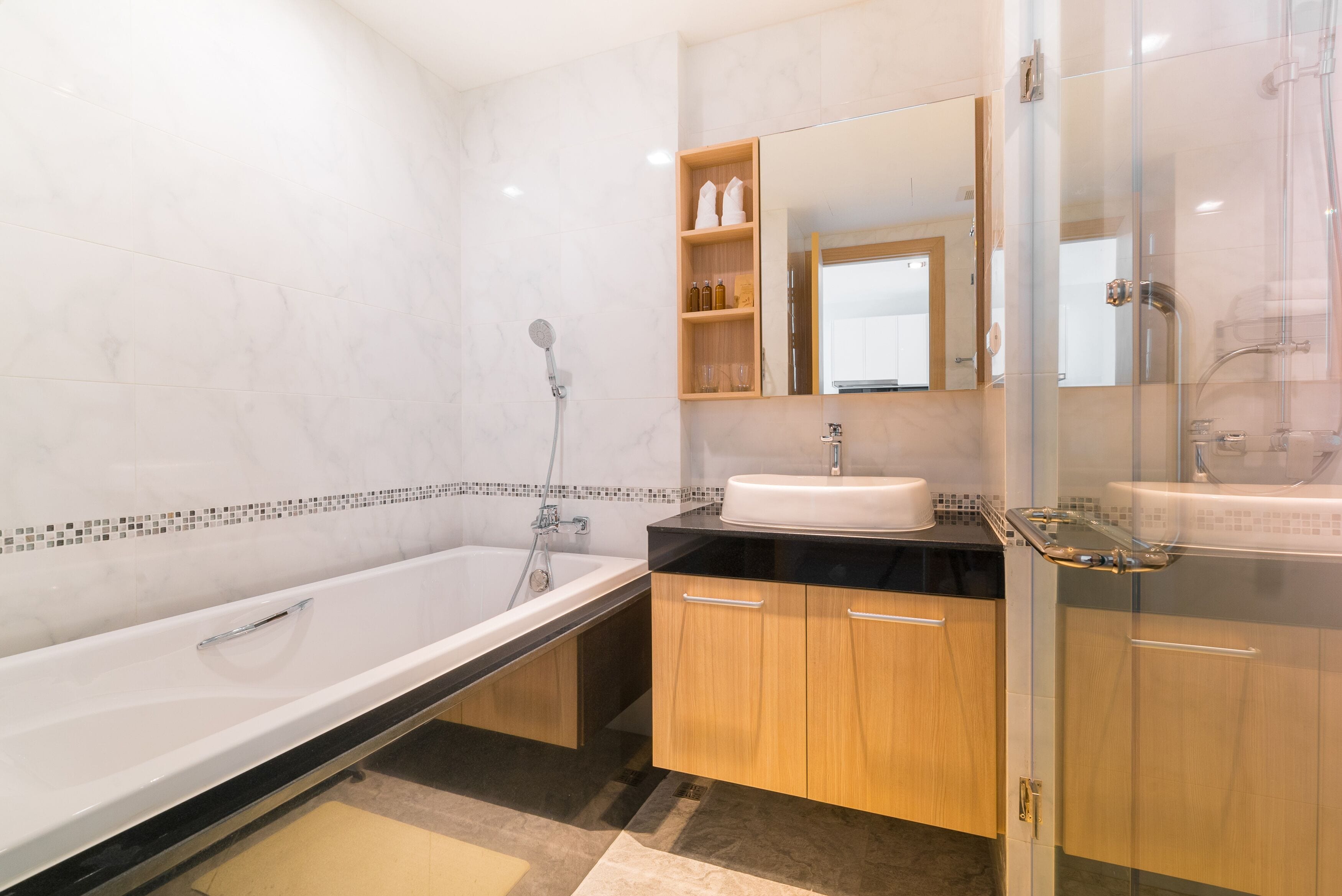 separate bathtub and shower, free toiletries, hair dryer, bathrobes