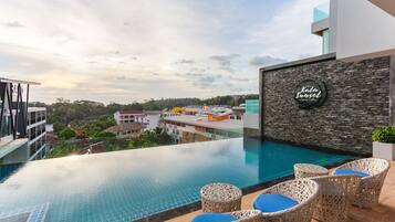2 outdoor pools, open 7:00 AM to 7:00 PM, pool loungers