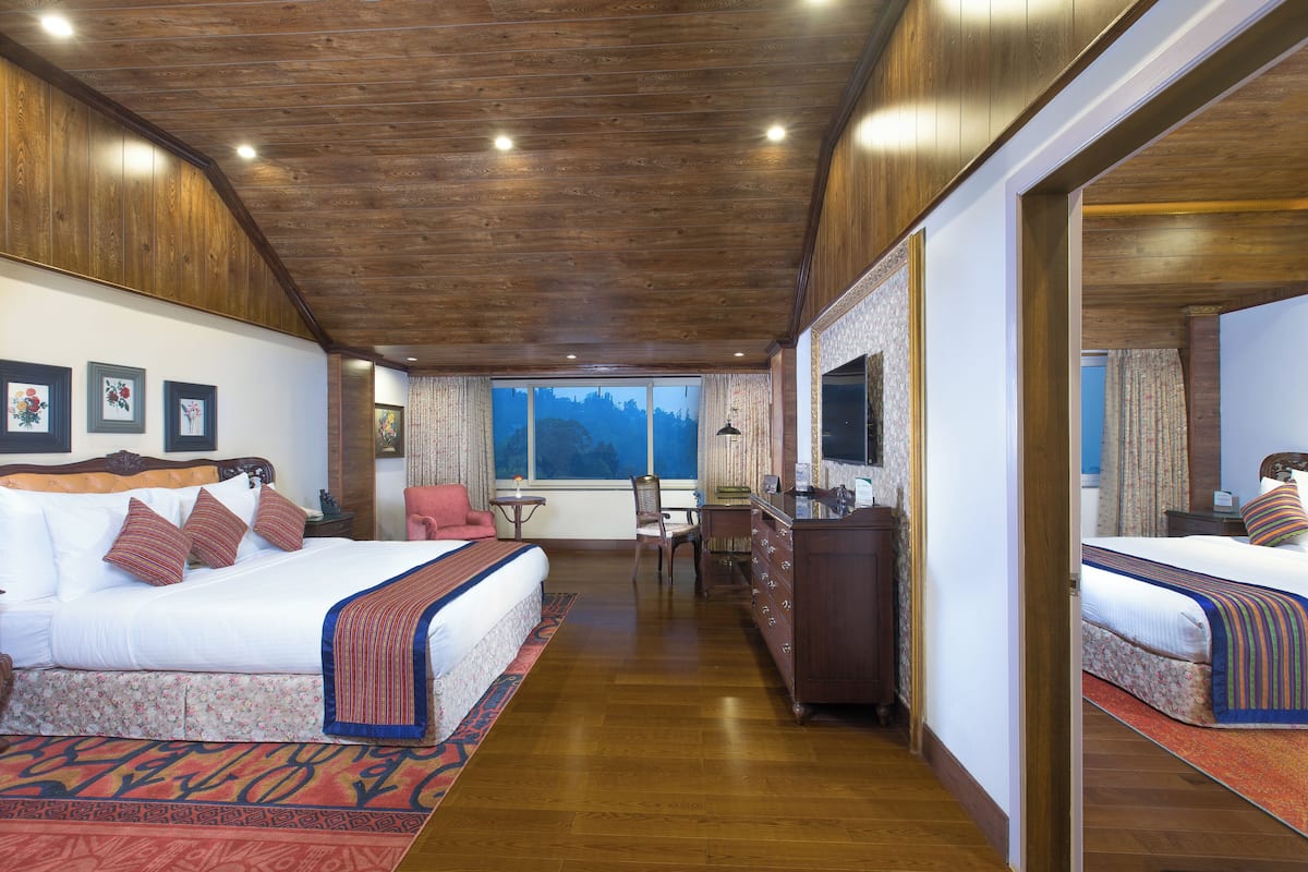 family room | 1 bedroom, premium bedding, in-room safe, desk