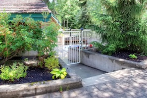 Stroll through the beautifully maintained garden, surrounded by lush greenery and vibrant flowers.
