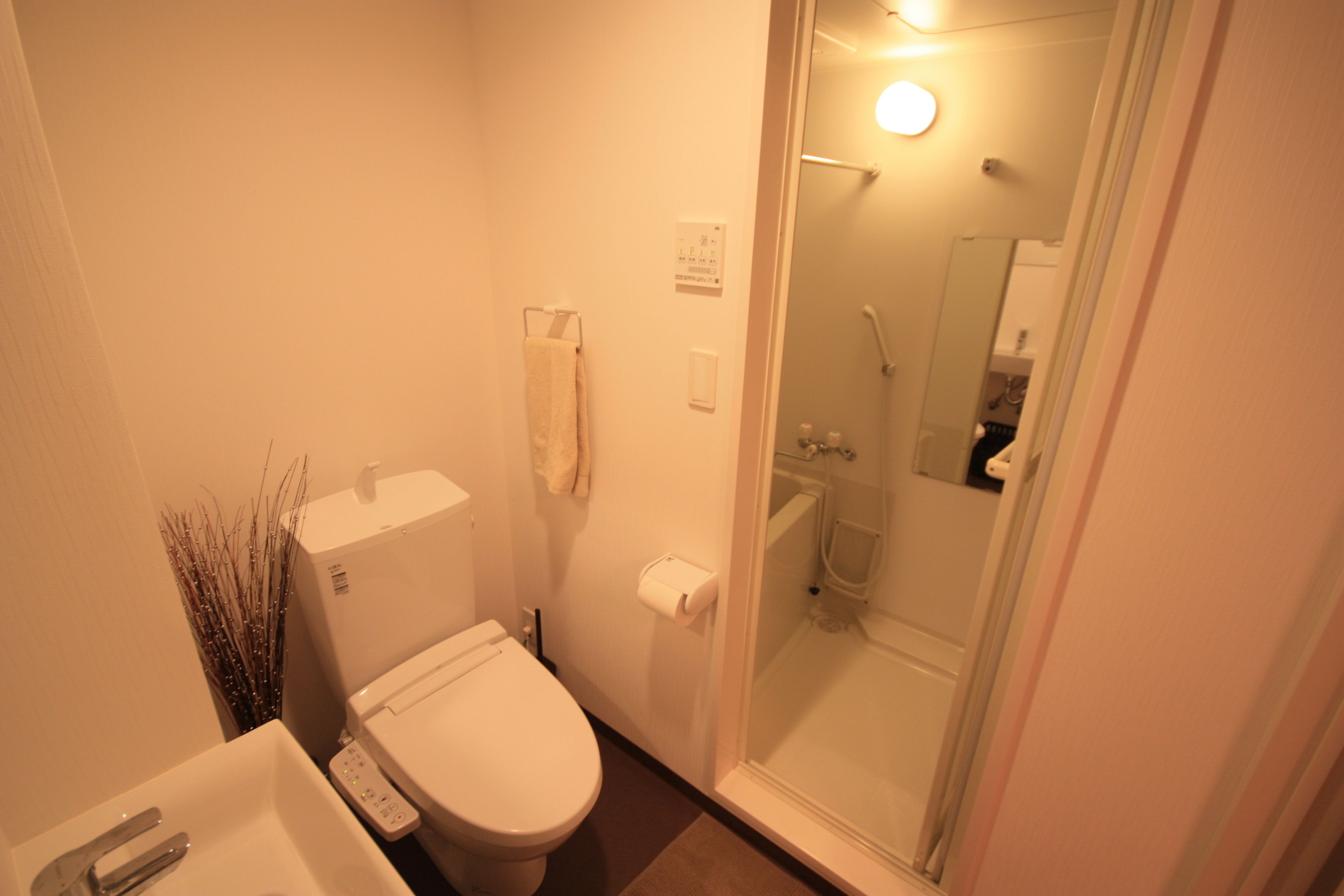 Quadruple Room, Non Smoking | Bathroom | Combined shower/tub, free toiletries, hair dryer, slippers