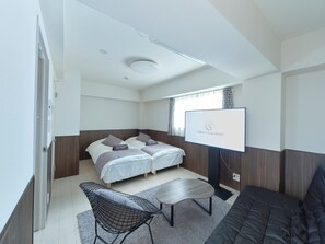 Vierpersoonskamer, niet-roken | Een bureau, gratis wifi, beddengoed