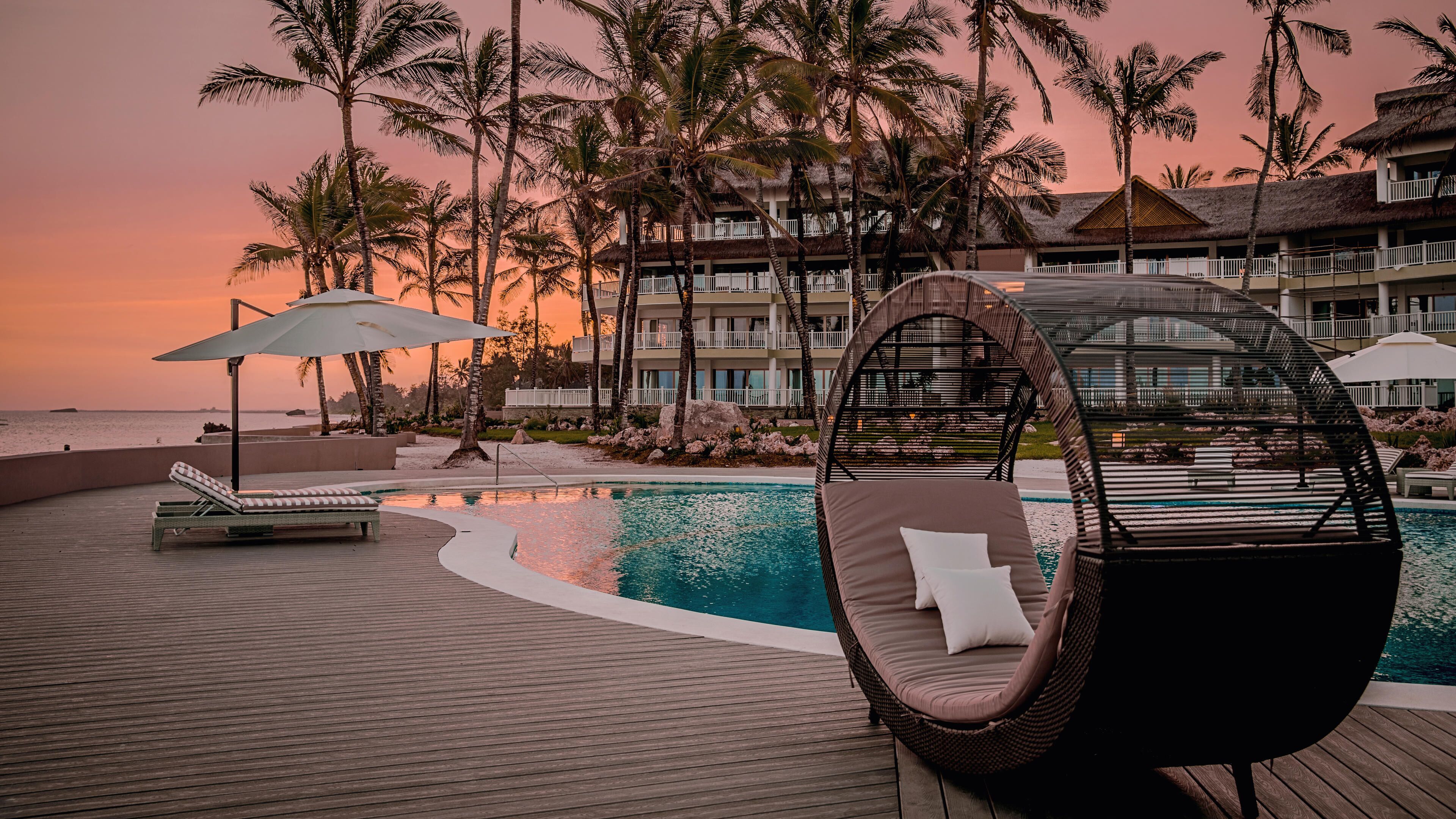 2 outdoor pools, pool umbrellas, pool loungers